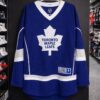 Originální hokejový dres Toronto Maple Leafs s potiskem hráče James van Riemsdyk a číslem 21 na zádech.